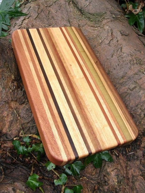 The Brittas Chopping Board is one of my Beaches Collection of Long Grain Chopping Boards,  handmade in contrasting strips of Sapele, Oak, Walnut & Poplar.