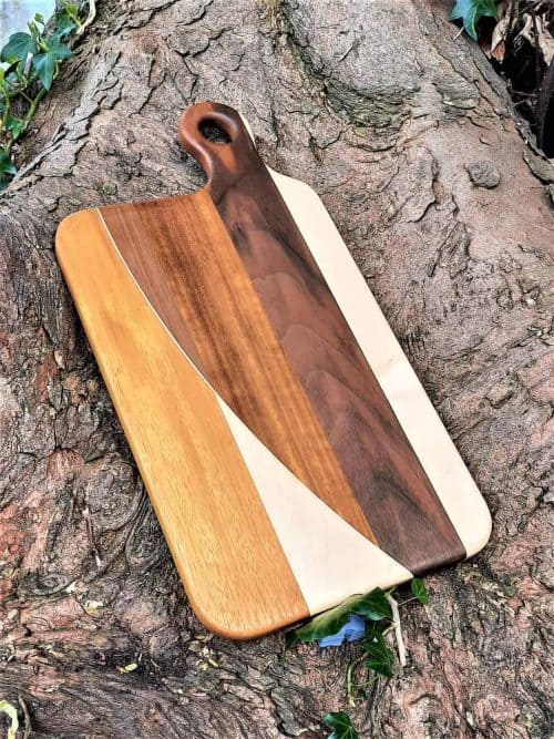 The Caramel Chopping & Serving Boards combine classic tones of Maple, Walnut & Iroko in striking patterns. My Face Grain Chopping & Serving Boards are Individually Handmade at my workshop in Malahide, Co. Dublin, each is Unique and will differ from others in the Range.