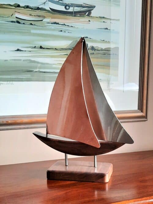 his Zanzibar is a Limited Edition Yacht Model designed in Copper & Stainless Steel inspired by a child's drawing of a sailing boat by Grant Designs.