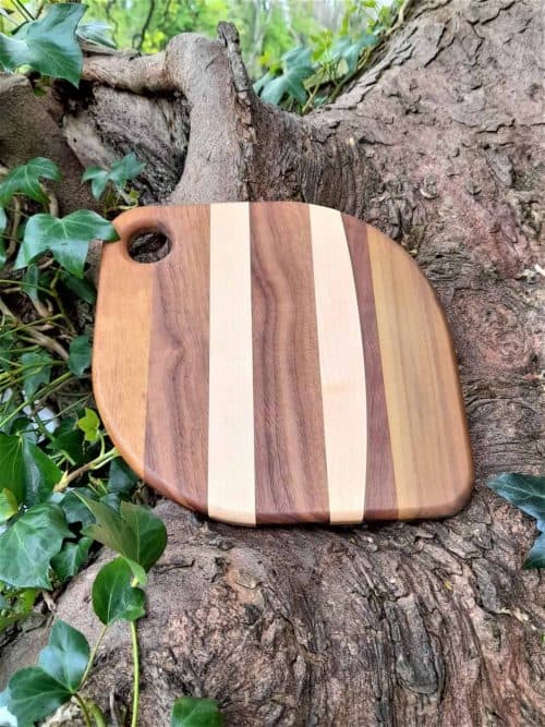 The Pistachio Fondue Cheese Boards combine Walnut, Maple, Iroko & Tulip Wood in elegant patterns. My Fondue Cheese Boards are Individually Handmade from sustainable hardwoods at my workshop in Malahide, Co. Dublin, each is Unique and will differ from others in the collection.