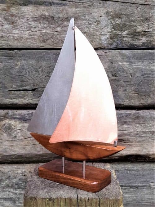 Zanzibar XIX is a Limited Edition Yacht Model designed in Copper & Stainless Steel inspired by a child's drawing of a sailing boat.