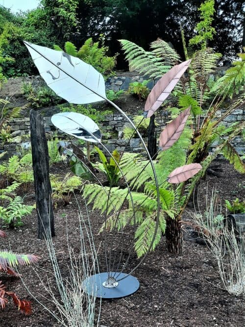 Eastwind is one of my new Garden Sculptures designed with a series of tapering leaves in Stainless Steel & Copper, on curved Stainless Steel stems. Designed to quiver in the breeze, reflect its natural environment, and give a sense of wellbeing and comfort, both visually and physically.