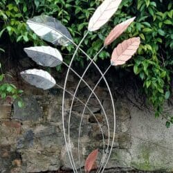 Northwind is one of the limited edition Stainless Steel Garden Sculptures in the Cardinal Leaf Sculpture Collection by Grant Designs