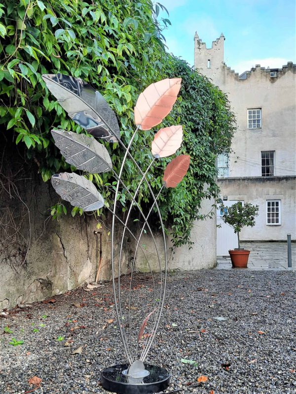 Northwind is one of the limited edition Stainless Steel Garden Sculptures in the Cardinal Leaf Sculpture Collection by Grant Designs