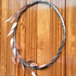 This Willow Copper & Stainless Steel Door Wreath was designed as an elegant garland for your hall door by Grant Designs.