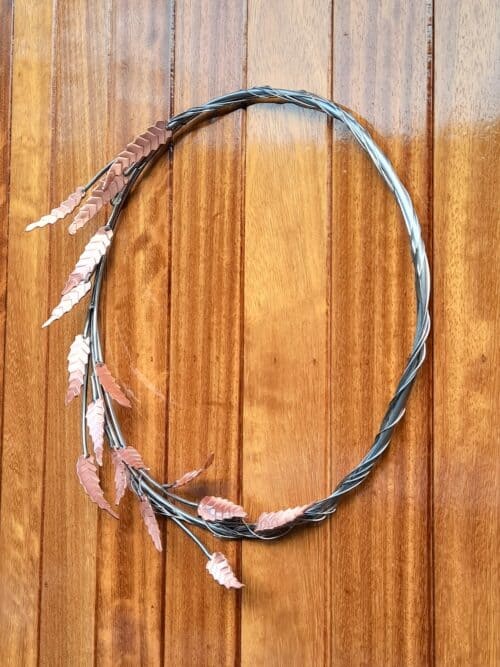 This Willow Copper & Stainless Steel Door Wreath was designed as an elegant garland for your hall door by Grant Designs.