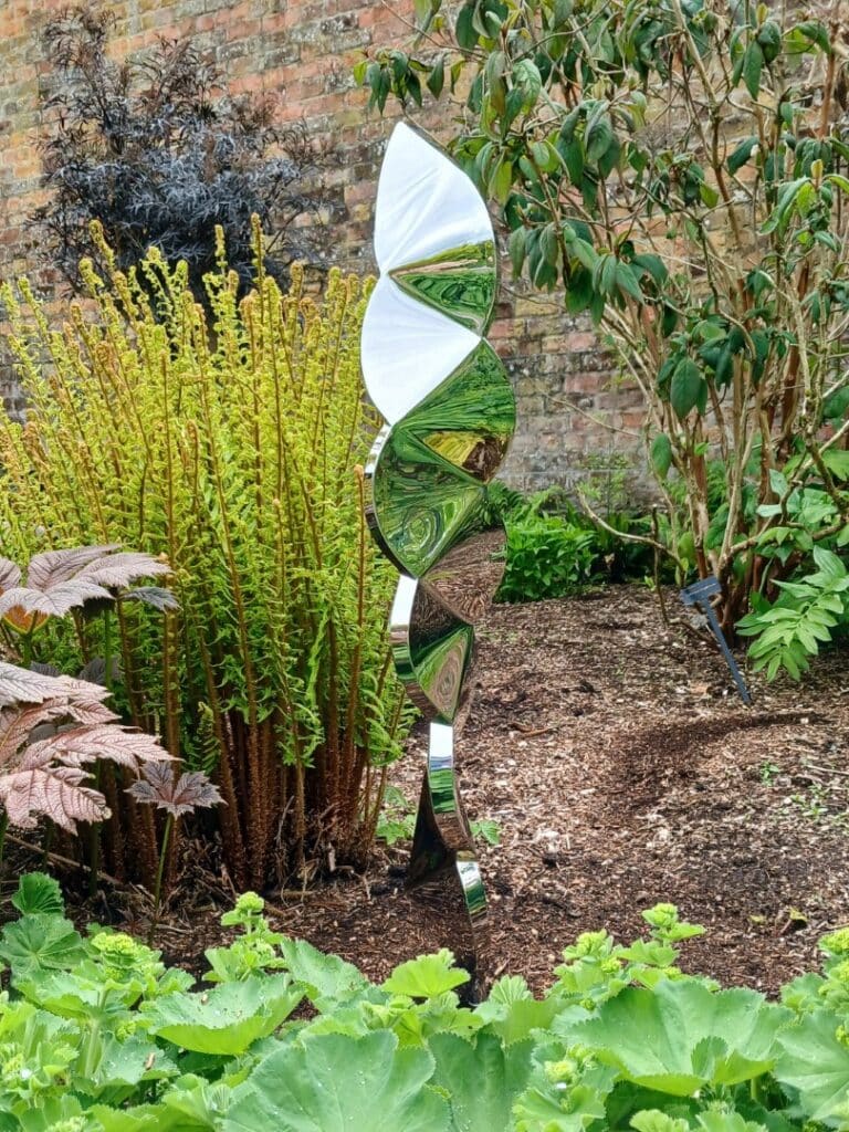 Harlequin Stainless Steel Sculpture at ForM Sculpture Exhibition 2026 in the Walled Garden of Bangor Castle